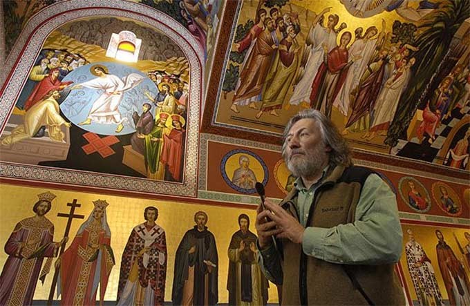 GEORGI poses in front of his mural-in-progress at St. Dimitrija Solunski Orthodox Church in Markham. Toronto Star.